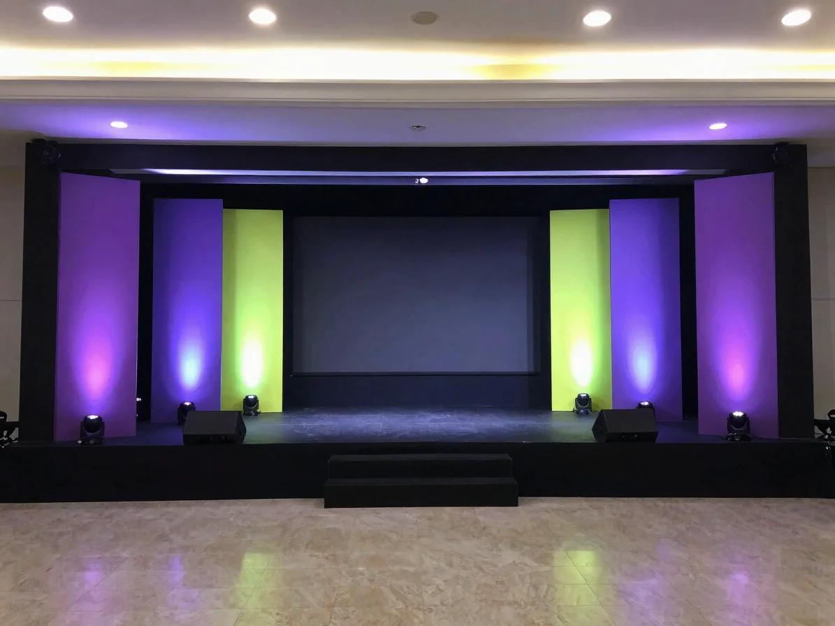 Editorial event photograph of a corporate stage with purple and l